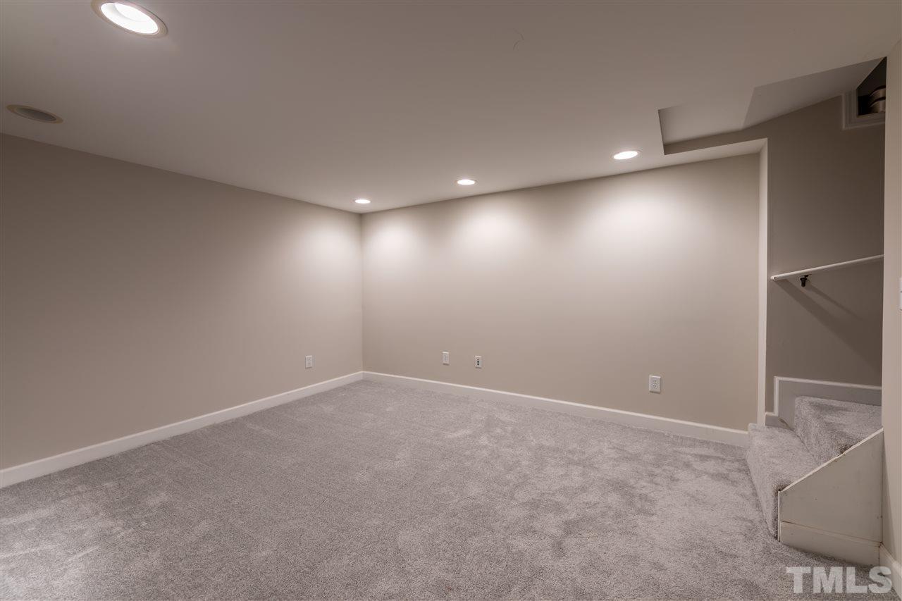 914 Canterbury Road Raleigh, NC 27607 - Photo 18 of 29 a view of an empty room