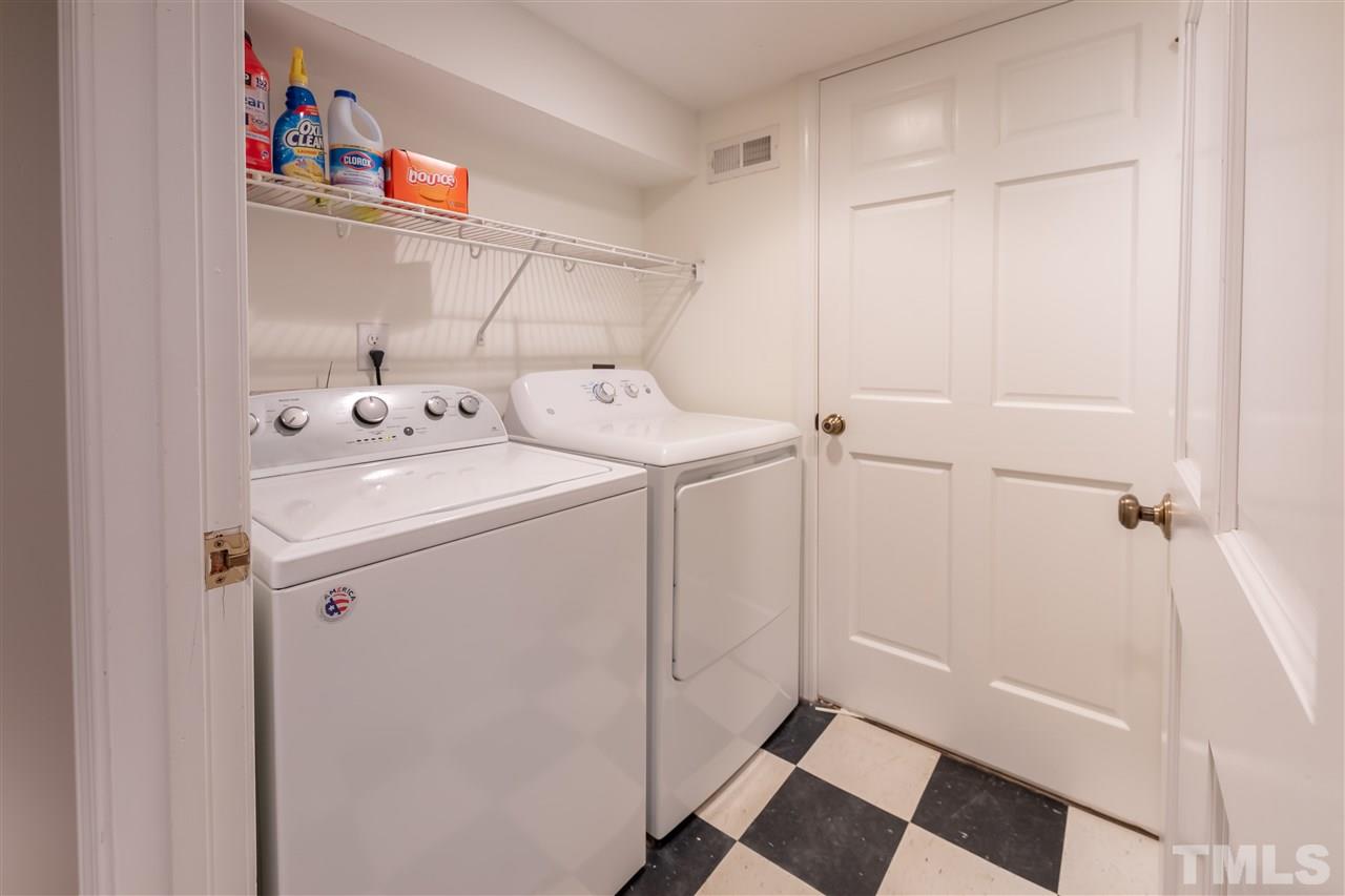 914 Canterbury Road Raleigh, NC 27607 - Photo 21 of 29 a utility room with dryer and washer