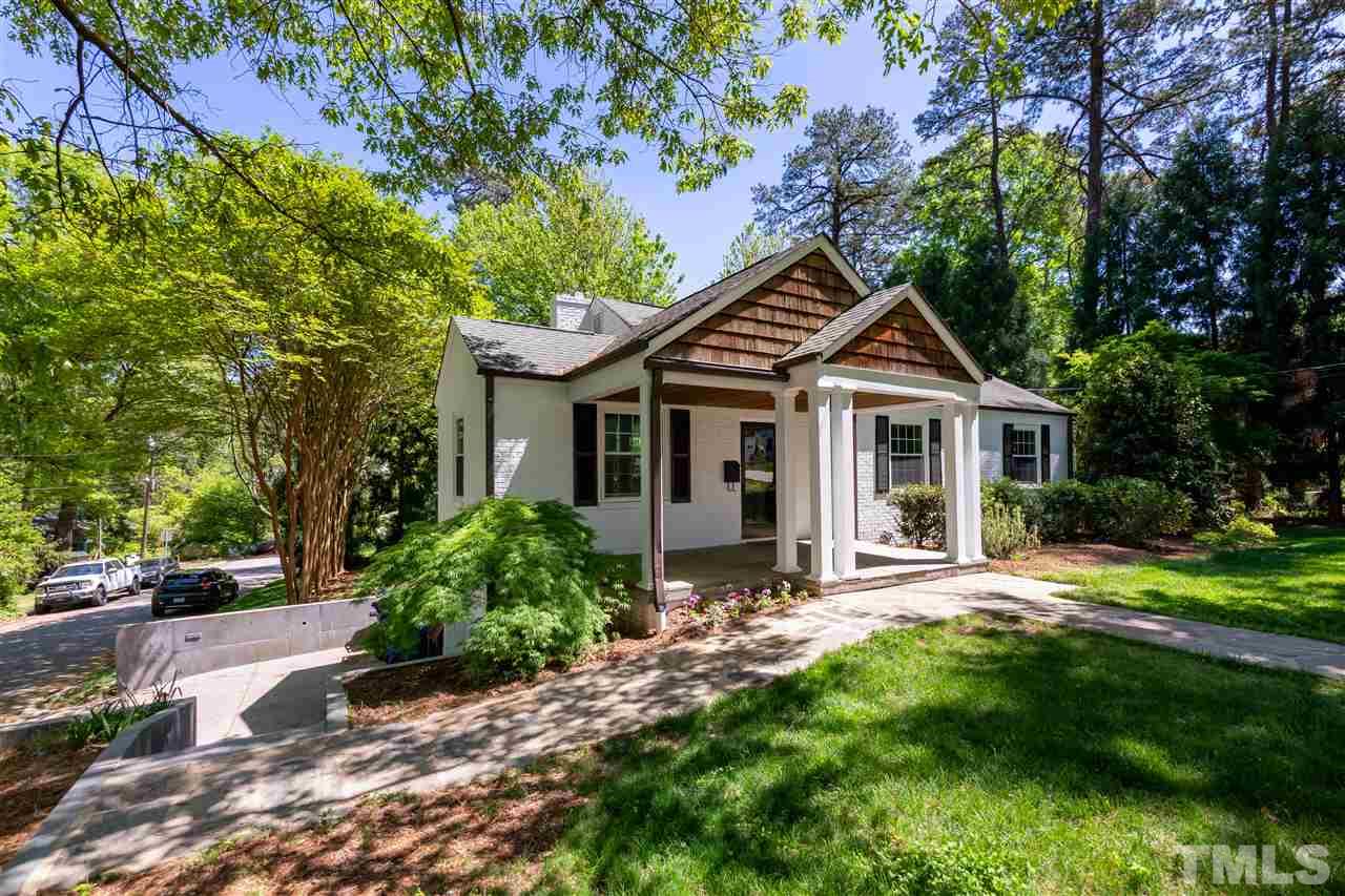 914 Canterbury Road Raleigh, NC 27607 - Photo 28 of 29 a front view of a house with a yard