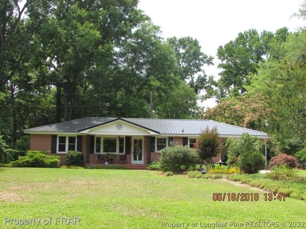 20 Page Road Godwin, NC 28344 - Photo 1 of 20 a front view of a house with a yard