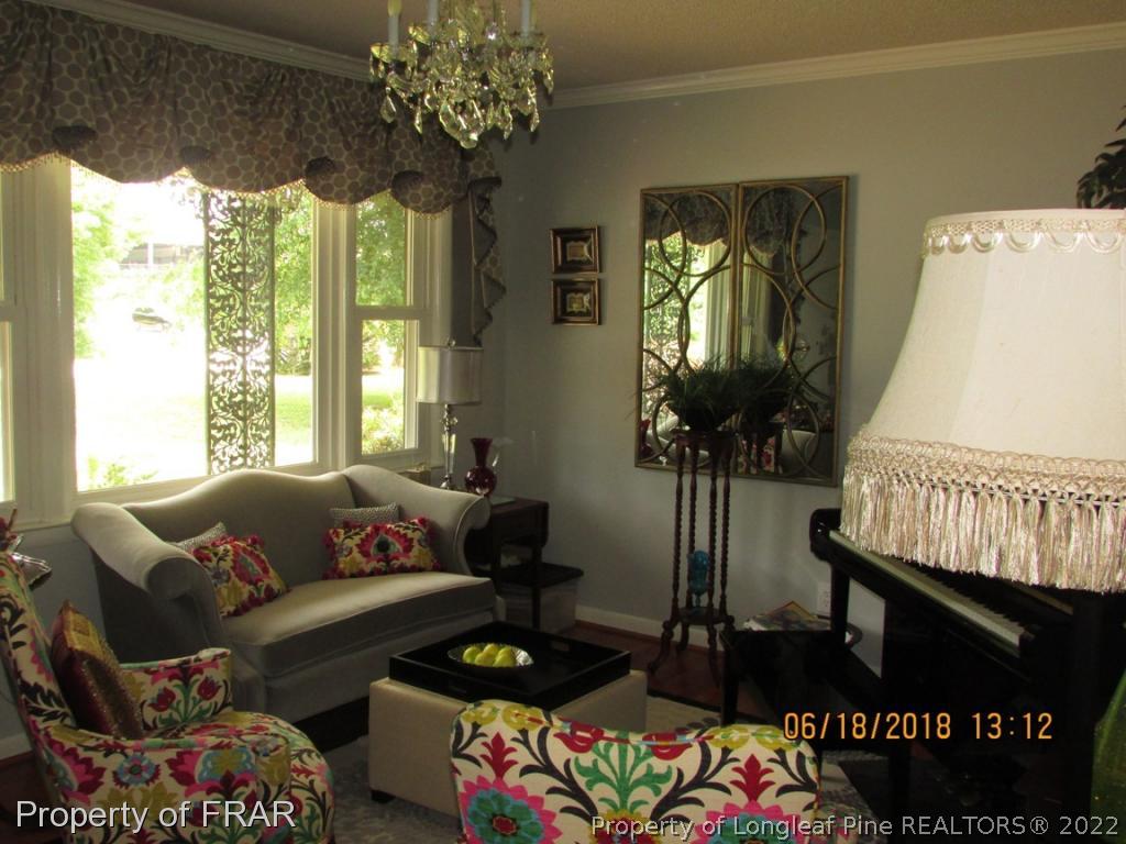 20 Page Road Godwin, NC 28344 - Photo 20 of 20 a living room with furniture and a large window