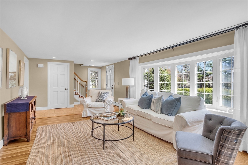 4 Thoreau Road Acton, MA 01720 - Photo 7 of 35 a living room with furniture and a large window