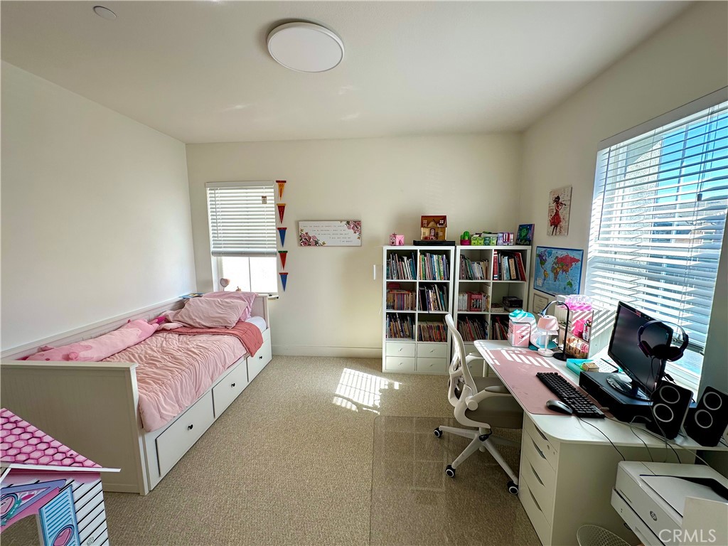 2036 Legacy Chino Hills, CA 91709 - Photo 17 of 20 a bedroom with a bed and a desk