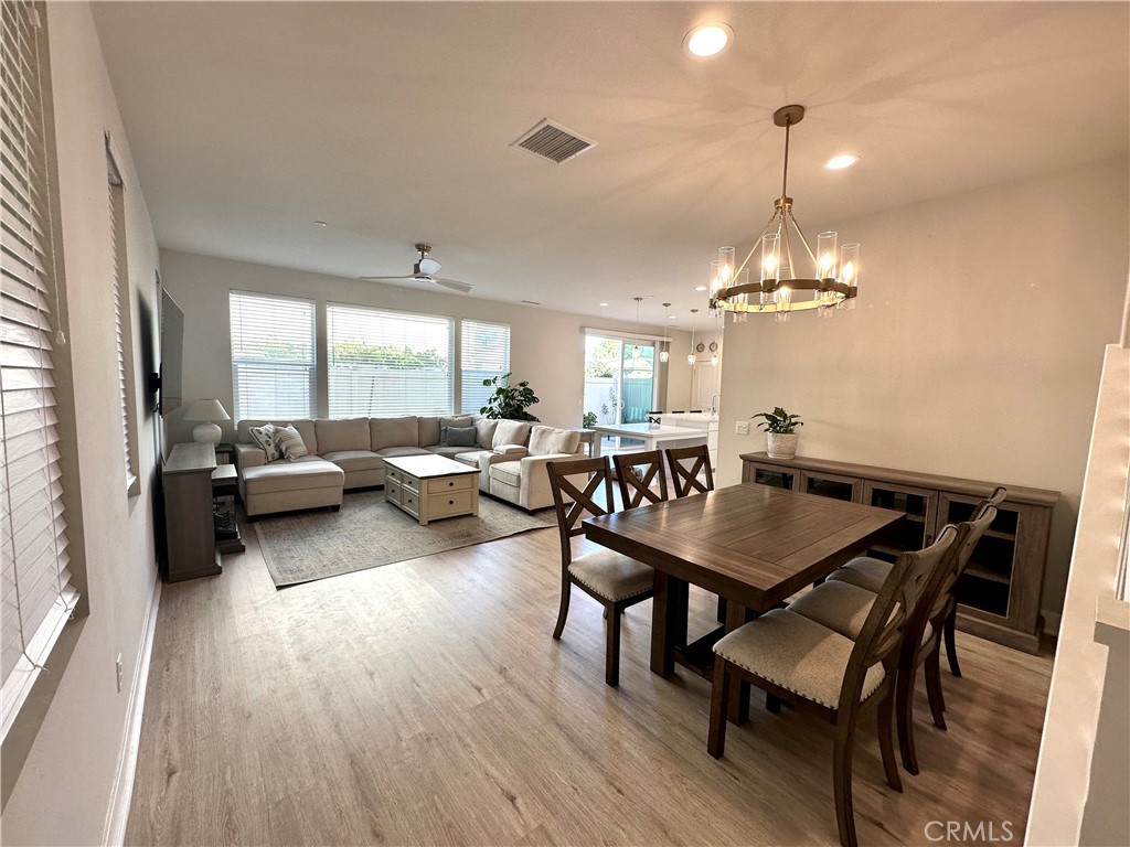 2036 Legacy Chino Hills, CA 91709 - Photo 9 of 20 a view of a dining room with furniture and wooden floor