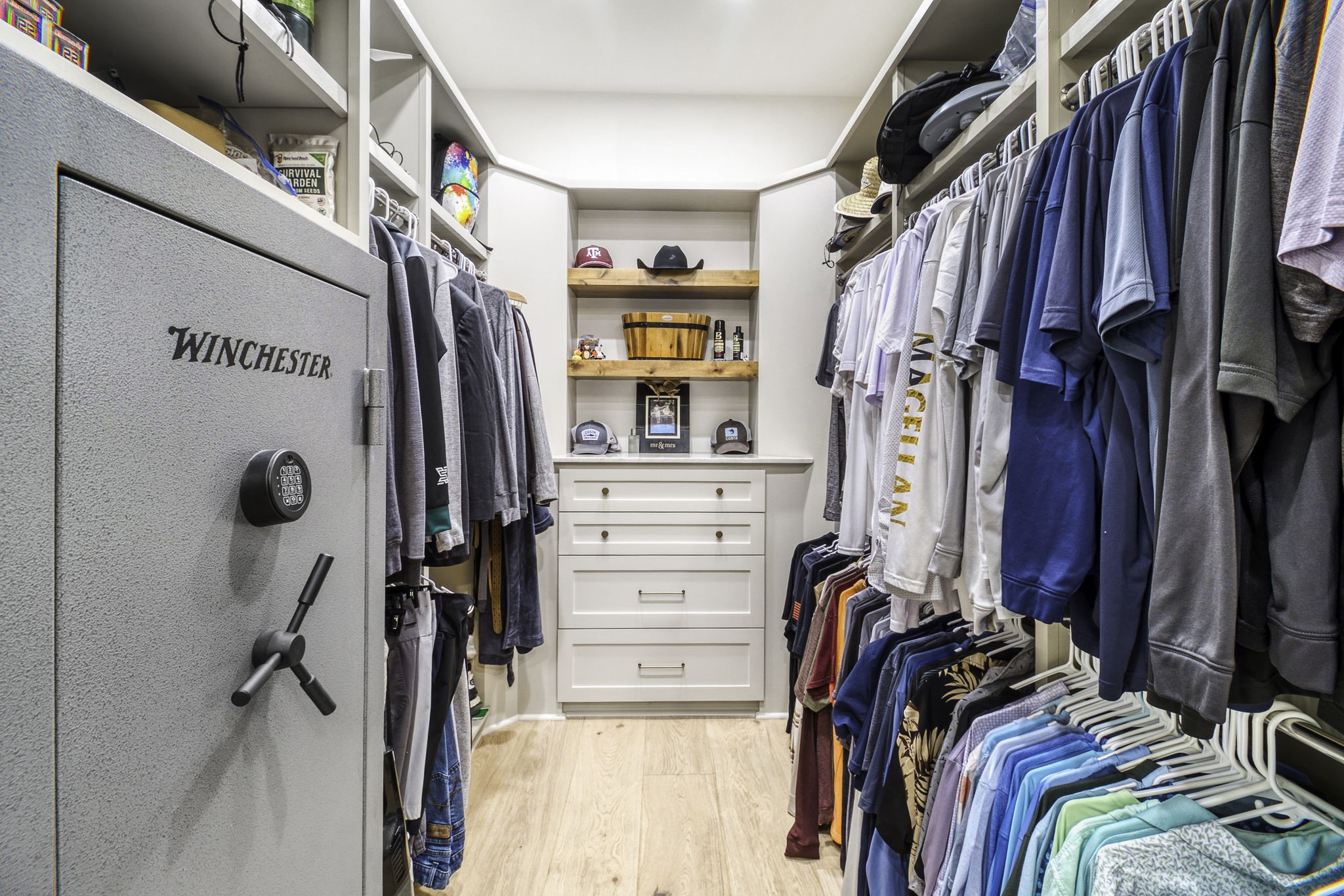 4602 Fm 3459 Road Onalaska, TX 77360 - Photo 27 of 45 a view of walk in closet with clothes