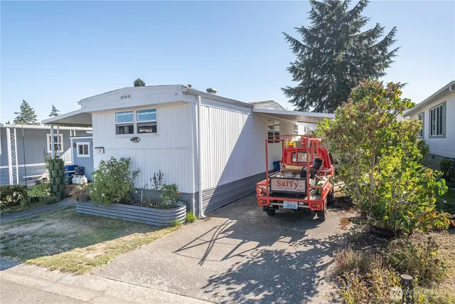 a car parked in front of a house