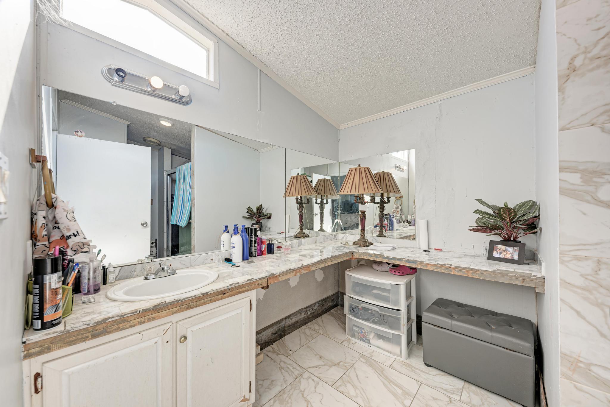 20113 Maynard Court Coupland, TX 78615 - Photo 17 of 37 a kitchen with a sink and cabinets