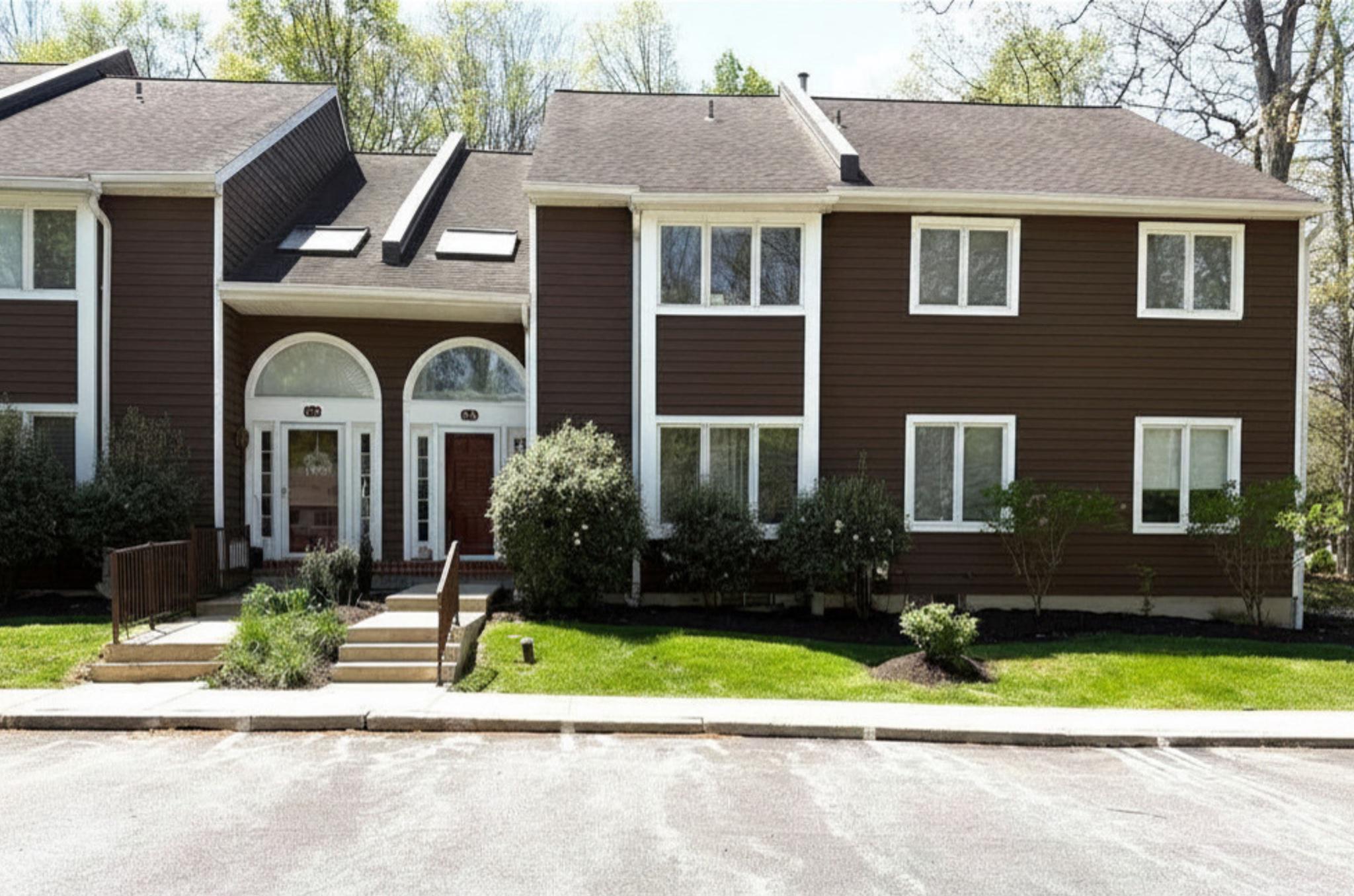 316 Fox Run Exton, PA 19341 - Photo 1 of 21 a front view of a house with a yard