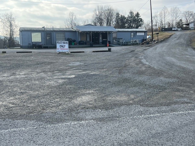 a view of a house with a back yard
