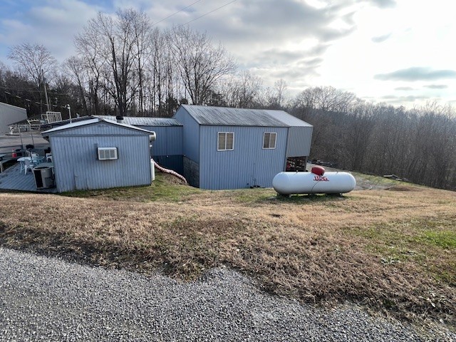 21 Bill Hunter Road Celina, TN 38551 - Photo 2 of 3 a house view with a backyard space