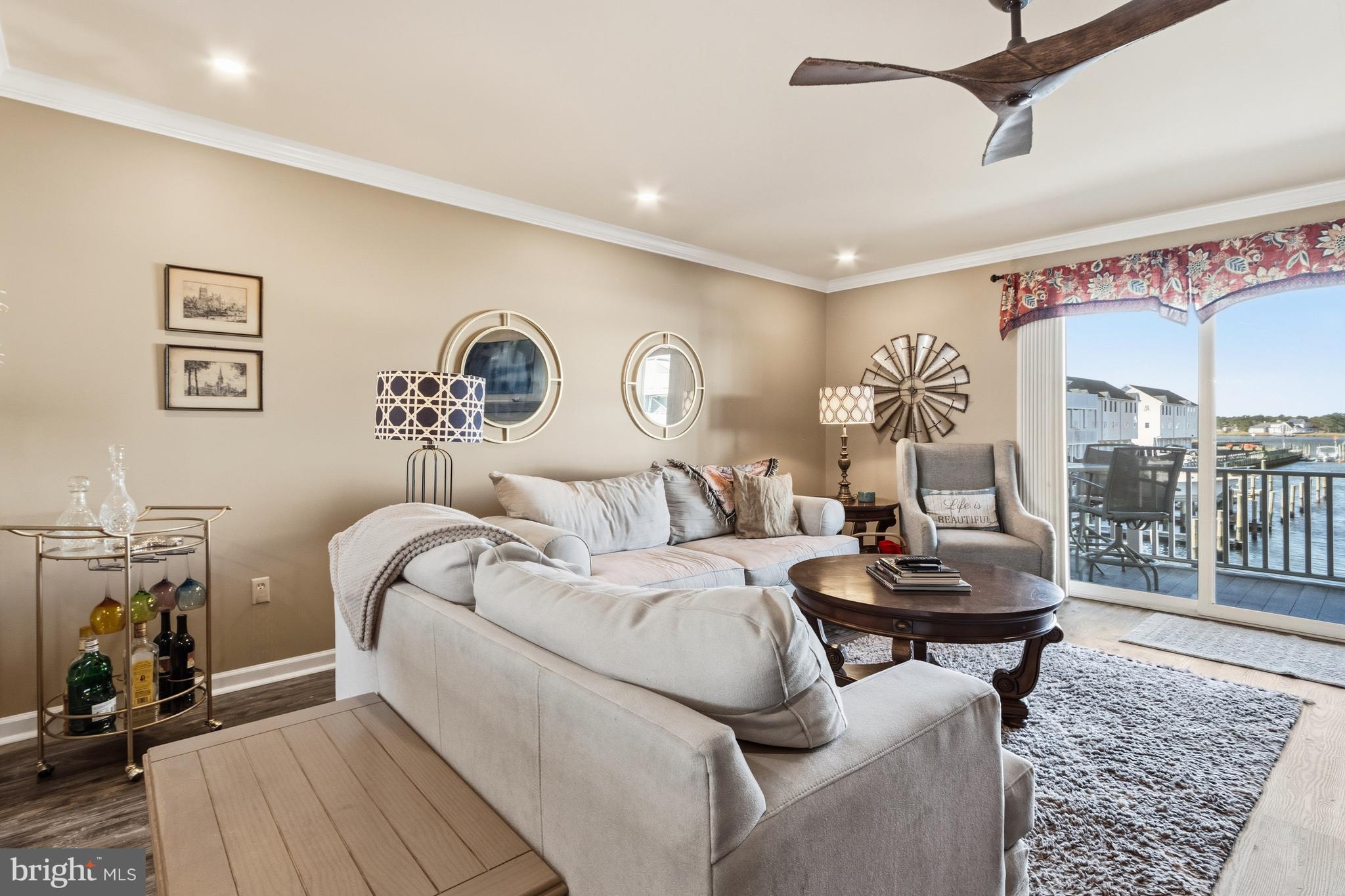 37896 Marina Road, Unit 4 Ocean View, DE 19970 - Photo 18 of 78 a bedroom with furniture and a wooden floor