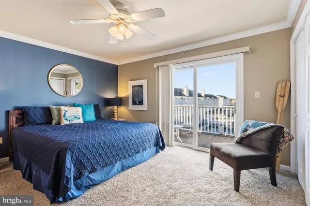 a bedroom with furniture and a chandelier