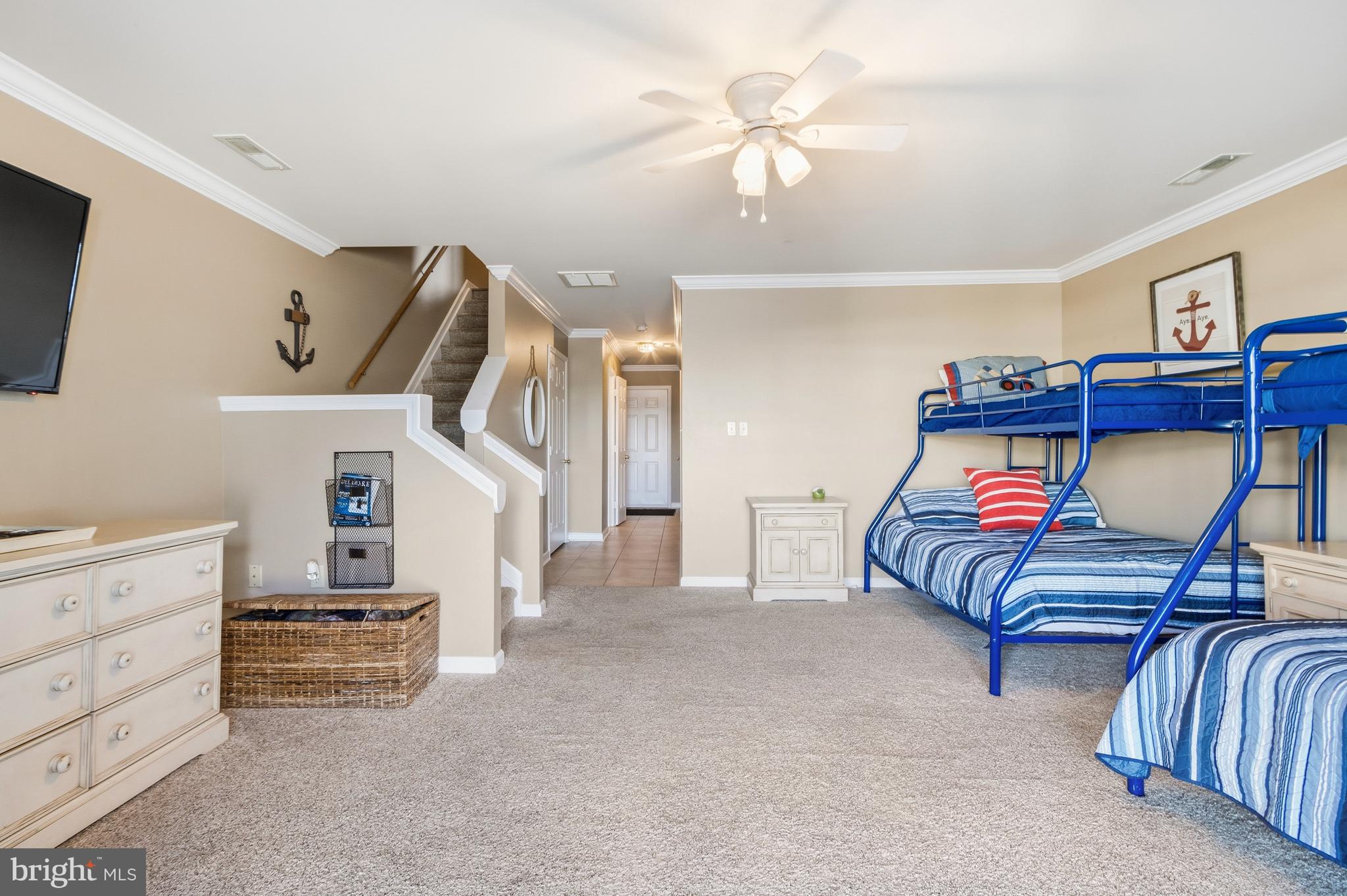 37896 Marina Road, Unit 4 Ocean View, DE 19970 - Photo 48 of 78 a bedroom with furniture and a chandelier