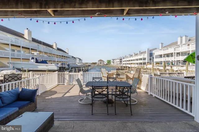 a picture of a room with a white wall and a picture