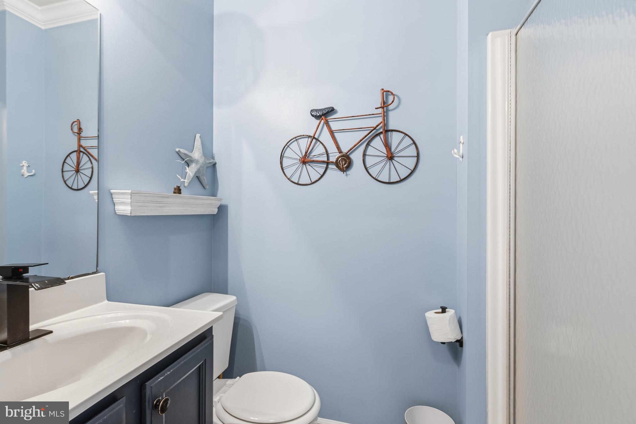 37896 Marina Road, Unit 4 Ocean View, DE 19970 - Photo 56 of 78 a bathroom with a toilet and a sink