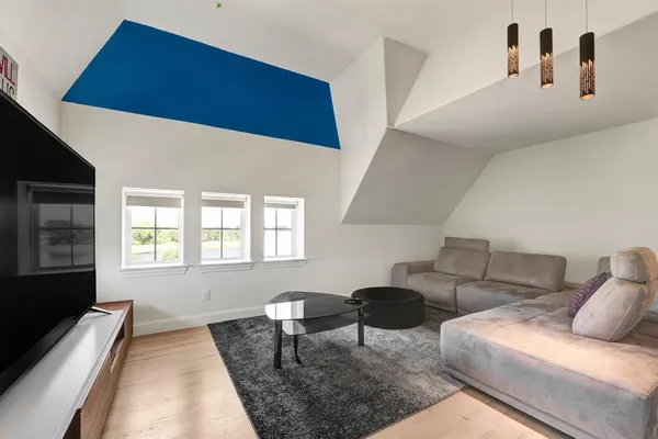 a living room with furniture and a couch