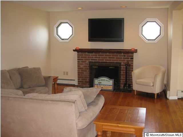 19 Griffin Street Monmouth Beach, NJ 07750 - Photo 9 of 20 Living Room With Fireplace