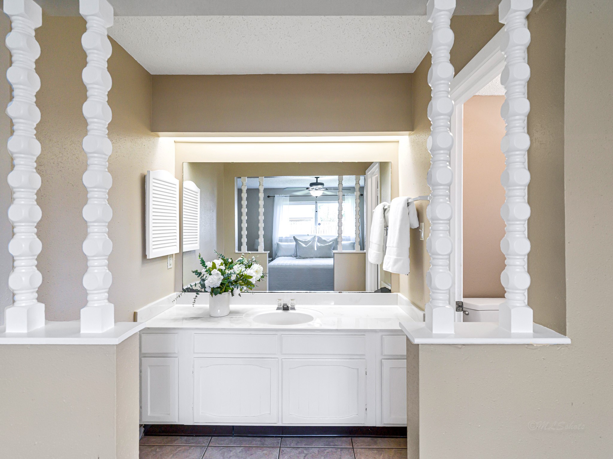 6230 Sunnygate Drive Spring, TX 77373 - Photo 19 of 33 Primary bath is oversized with vanity area open to the bedroom.
