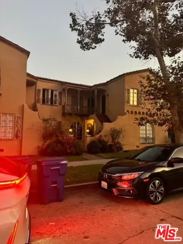 a car parked in front of a house
