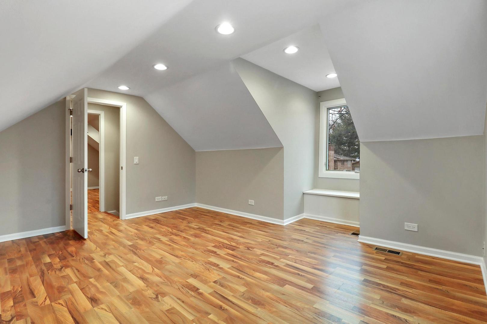 419 Foster Road Wauconda, IL 60084 - Photo 13 of 21 an empty room with wooden floor and windows