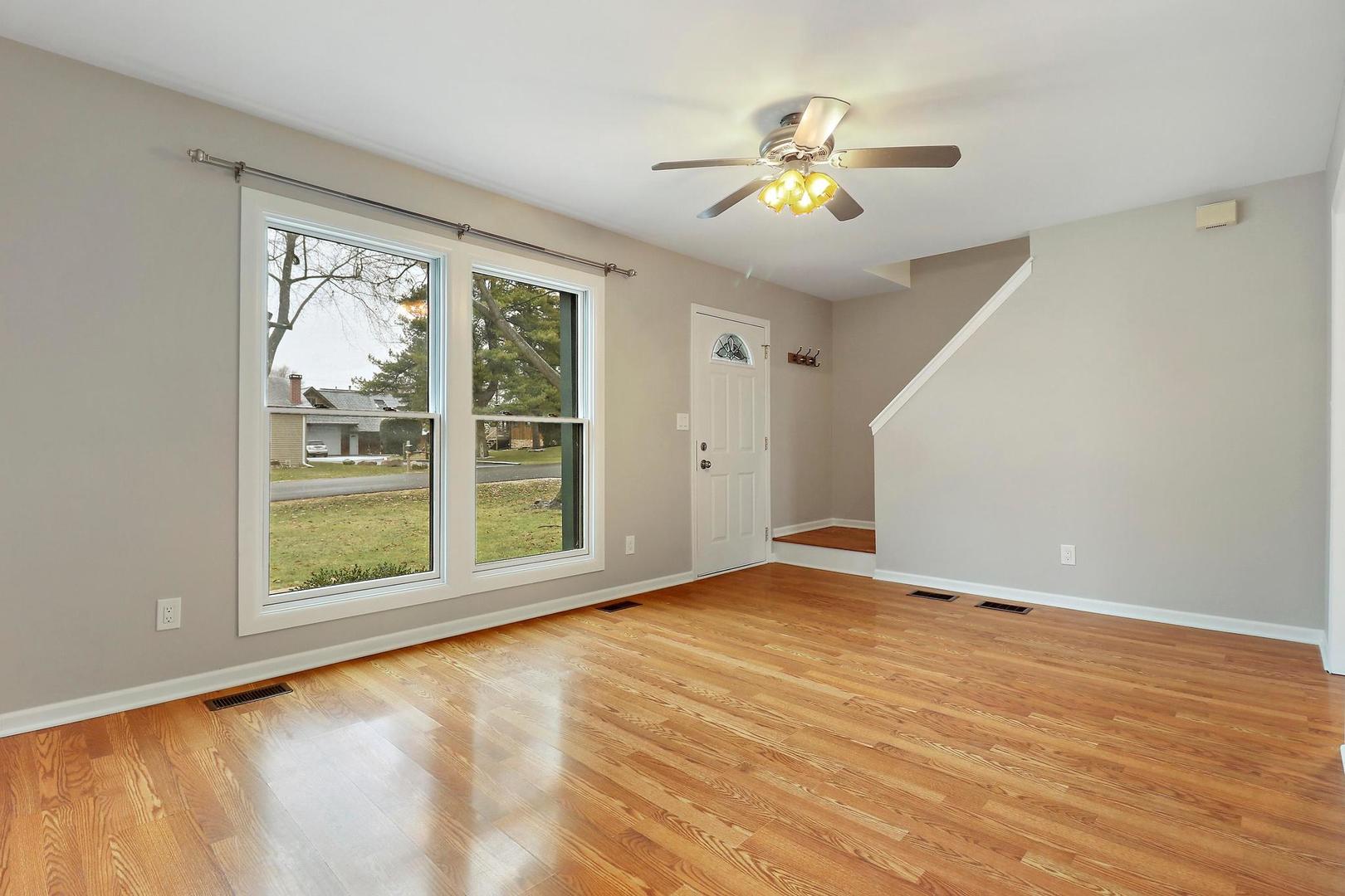 419 Foster Road Wauconda, IL 60084 - Photo 3 of 21 a view of an empty room with a window