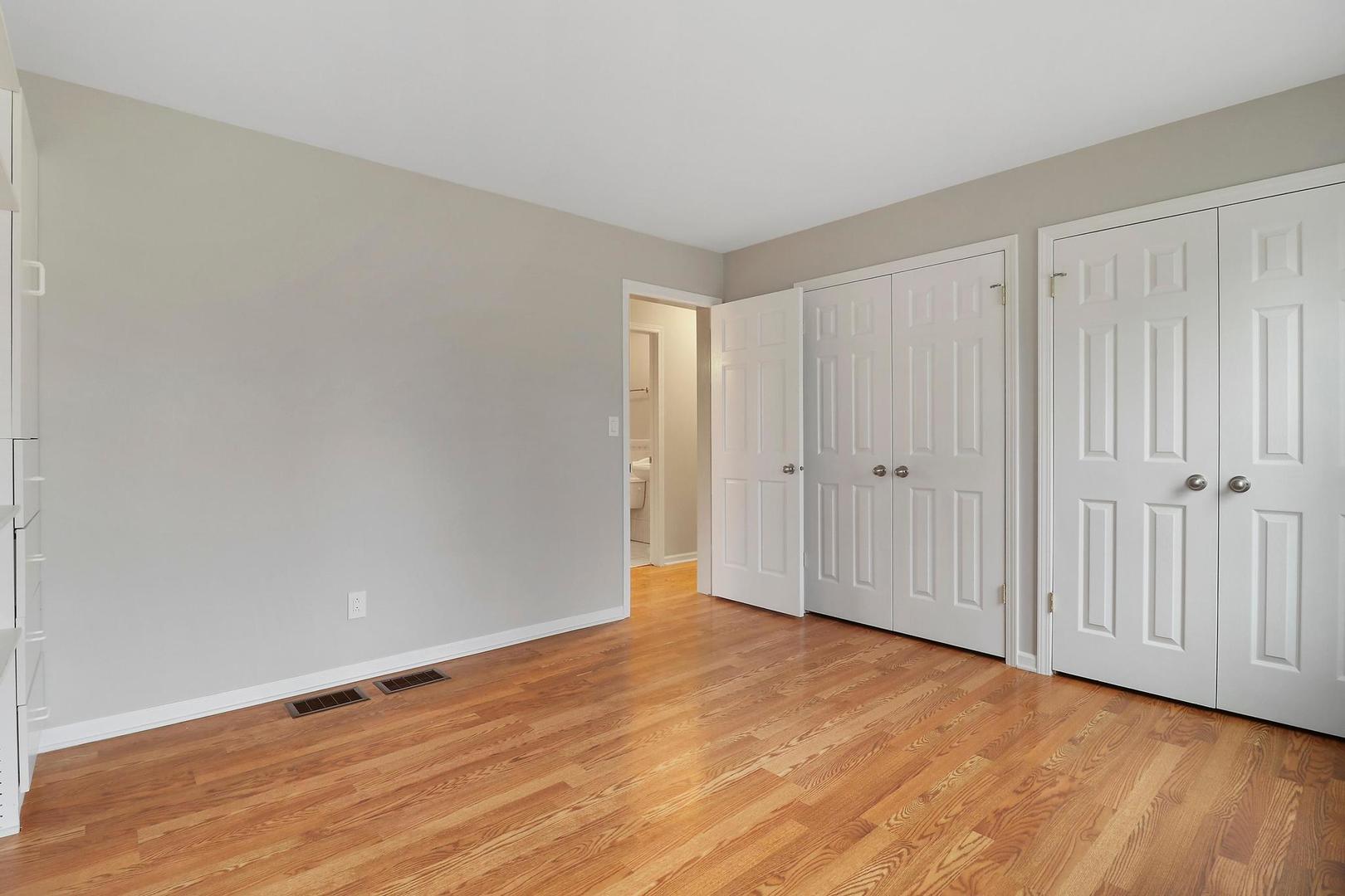 419 Foster Road Wauconda, IL 60084 - Photo 8 of 21 a view of an empty room with wooden floor