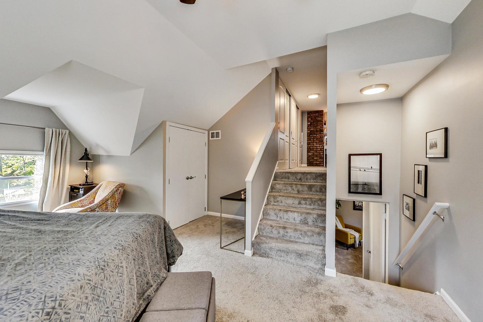 138 Northgate Road Riverside, IL 60546 - Photo 12 of 30 a view of a livingroom with wooden floor and staircase