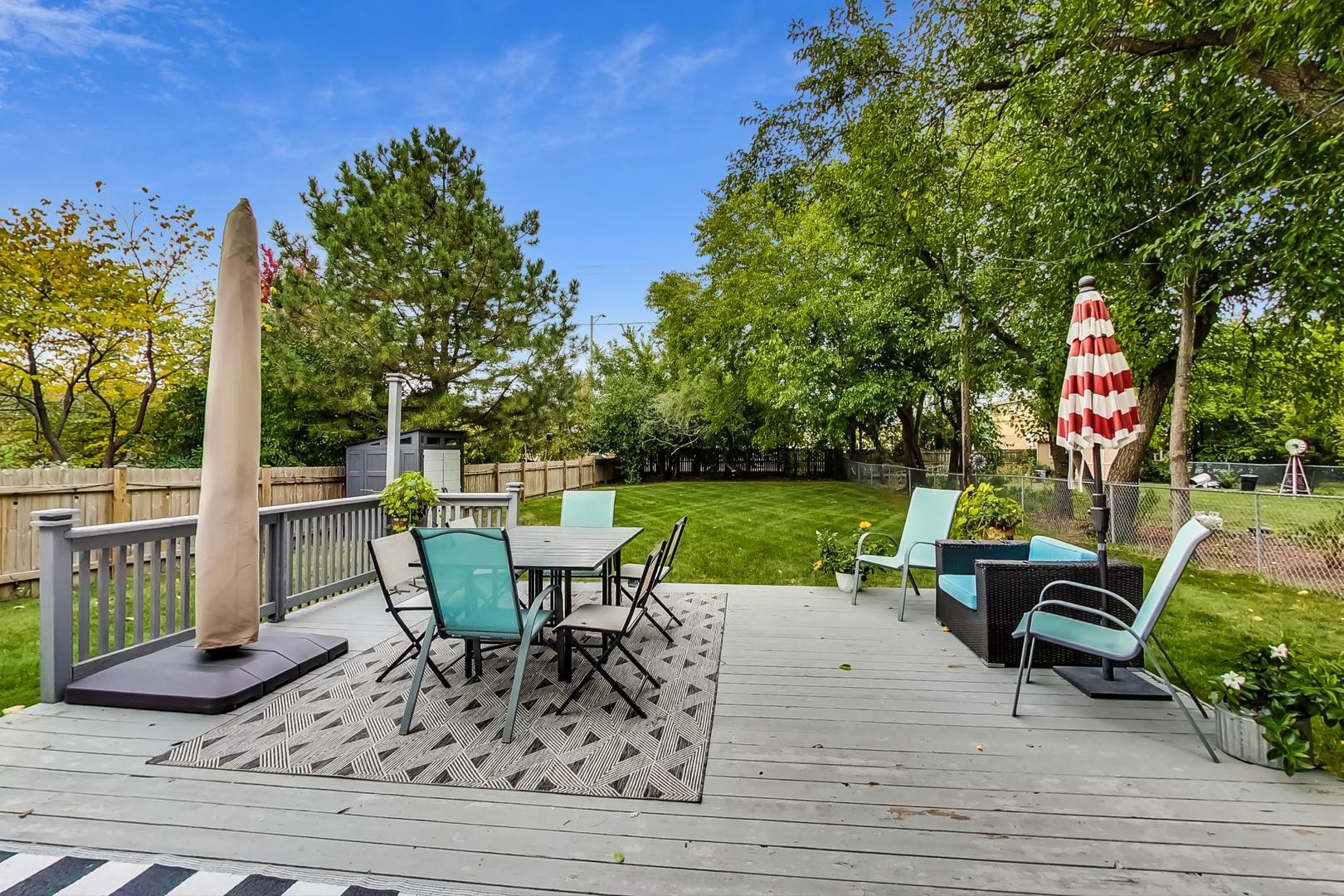 138 Northgate Road Riverside, IL 60546 - Photo 23 of 30 a view of a table and chairs in the patio