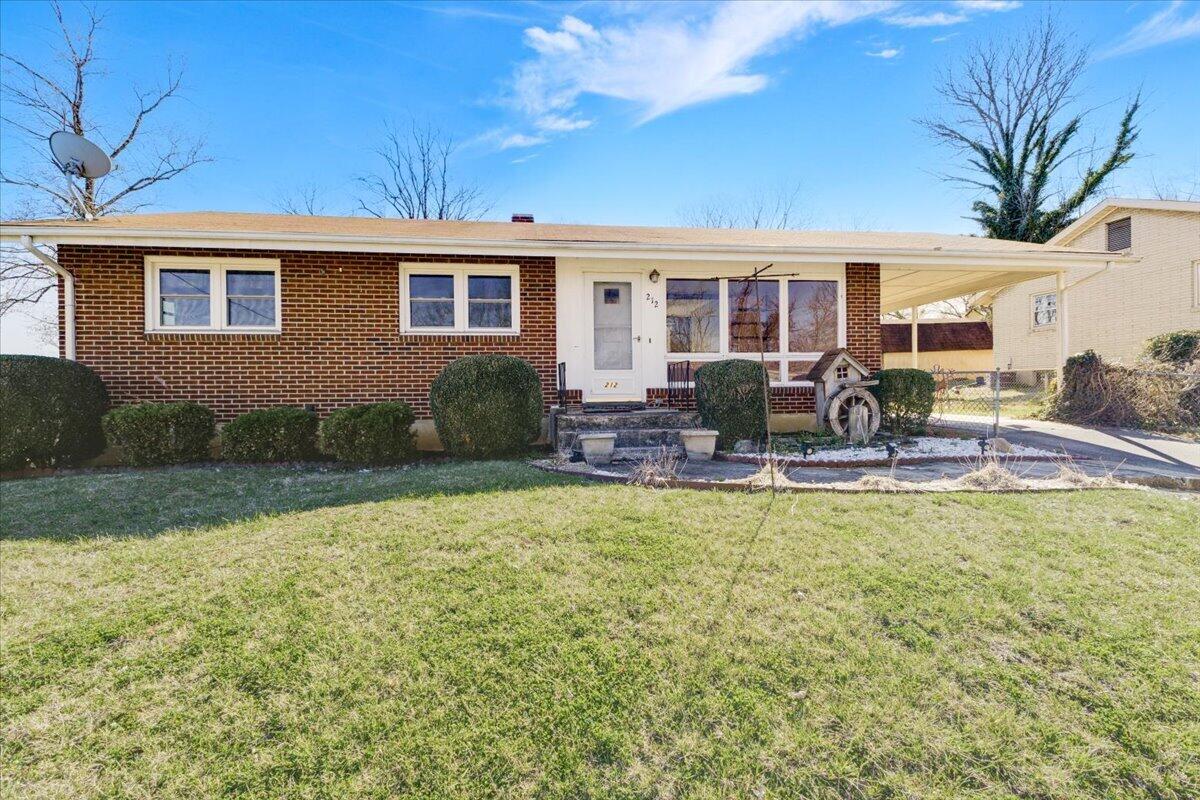 212 Cherryhill Road Northwest Roanoke, VA 24017 - Photo 1 of 30 a view of a house with swimming pool and sitting area