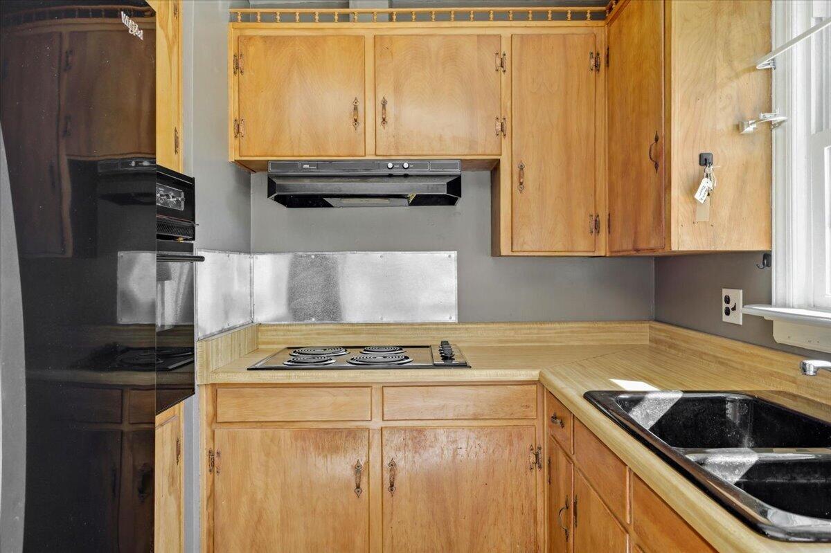 212 Cherryhill Road Northwest Roanoke, VA 24017 - Photo 12 of 30 a kitchen with granite countertop cabinets and steel stainless steel appliances