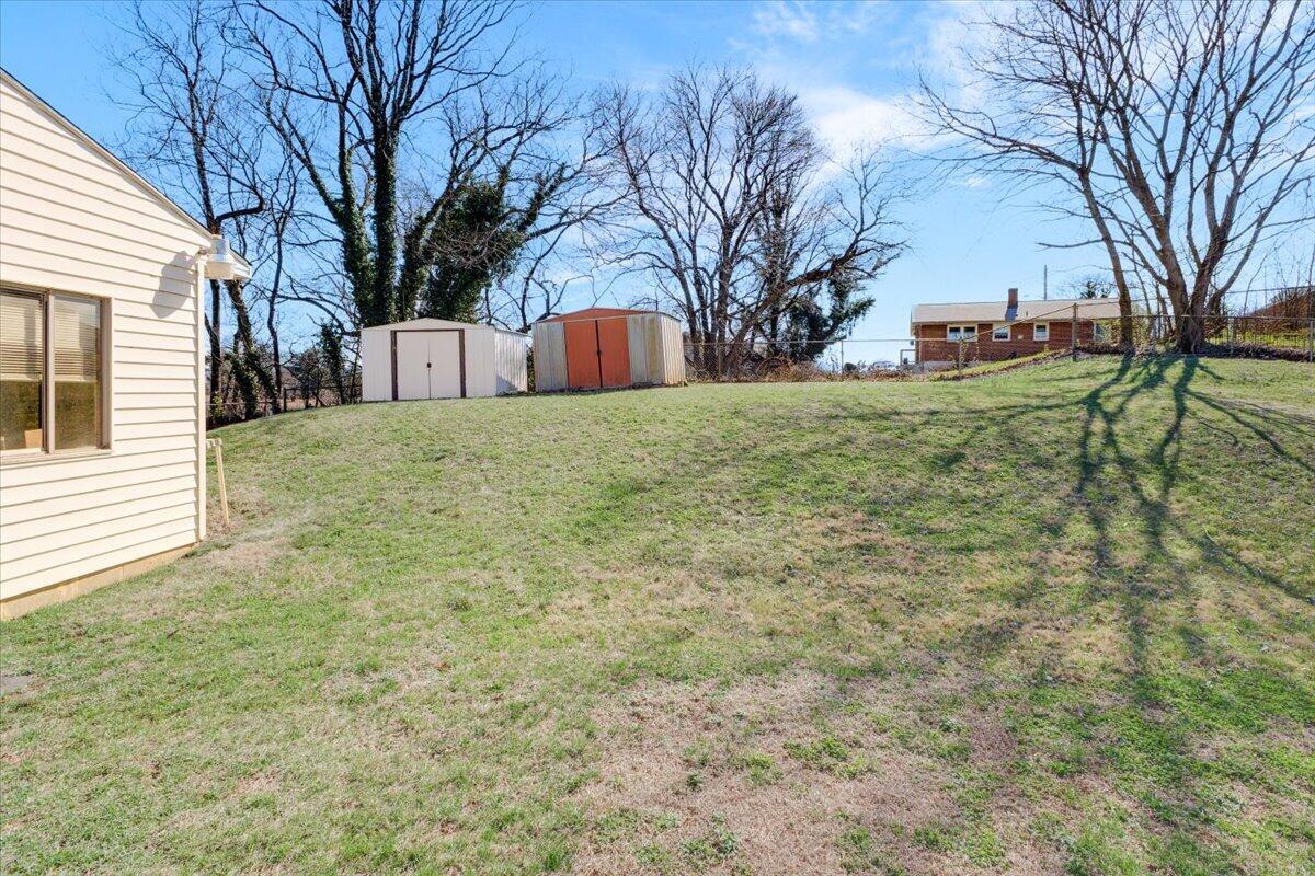 212 Cherryhill Road Northwest Roanoke, VA 24017 - Photo 13 of 30 a view of a yard with brick house