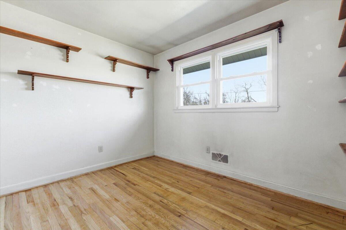 212 Cherryhill Road Northwest Roanoke, VA 24017 - Photo 25 of 30 a view of room with window and hardwood floor