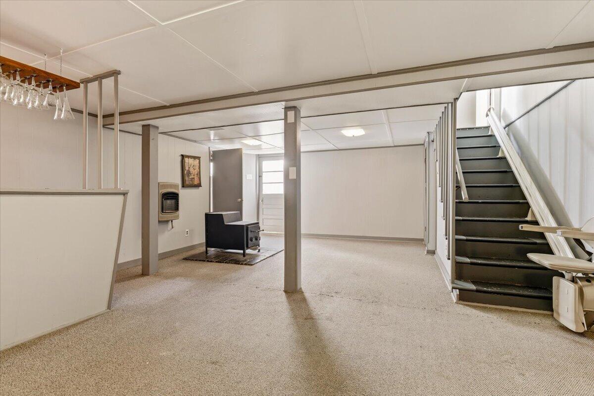 212 Cherryhill Road Northwest Roanoke, VA 24017 - Photo 28 of 30 a view of a hallway with wooden shelves and door