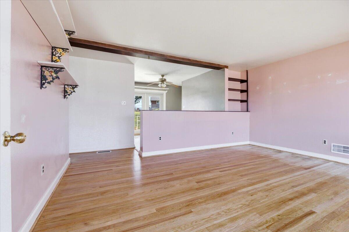 212 Cherryhill Road Northwest Roanoke, VA 24017 - Photo 6 of 30 a view of a room with wooden floor and staircase