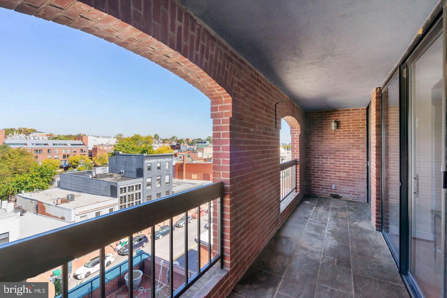 1080 Wisconsin Avenue Northwest, Unit 501 Washington, DC 20007 - Photo 11 of 36 a city view from a balcony
