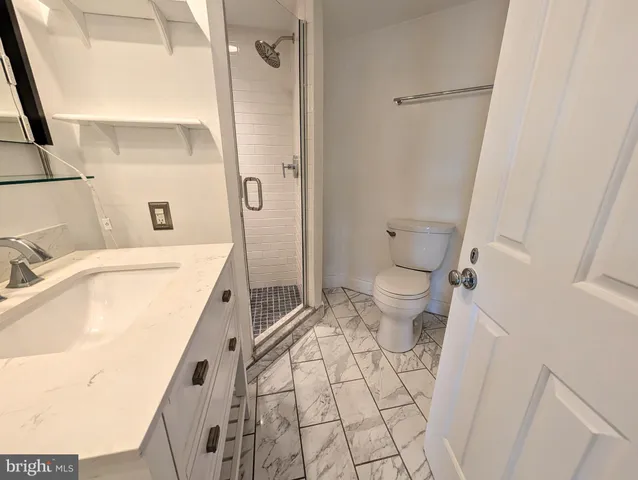 a view of washer and dryer in a utility room