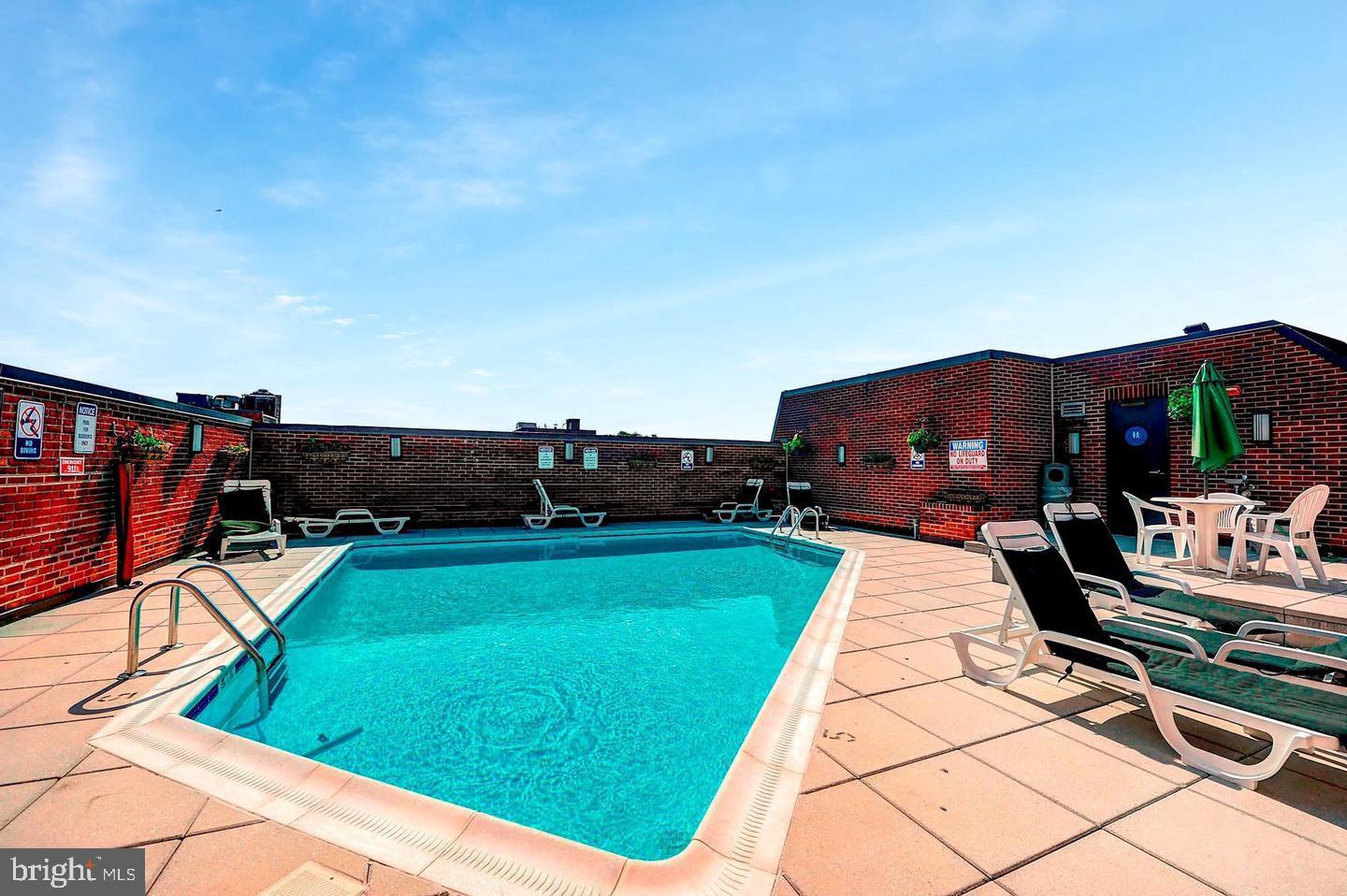 1080 Wisconsin Avenue Northwest, Unit 501 Washington, DC 20007 - Photo 27 of 36 a view of swimming pool with seating area