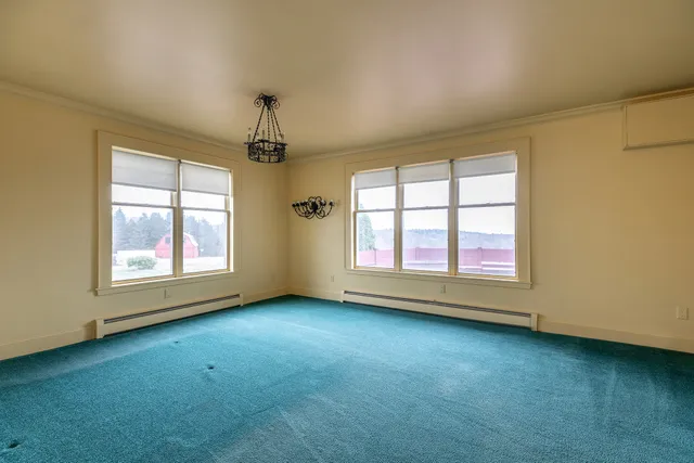 an empty room with windows