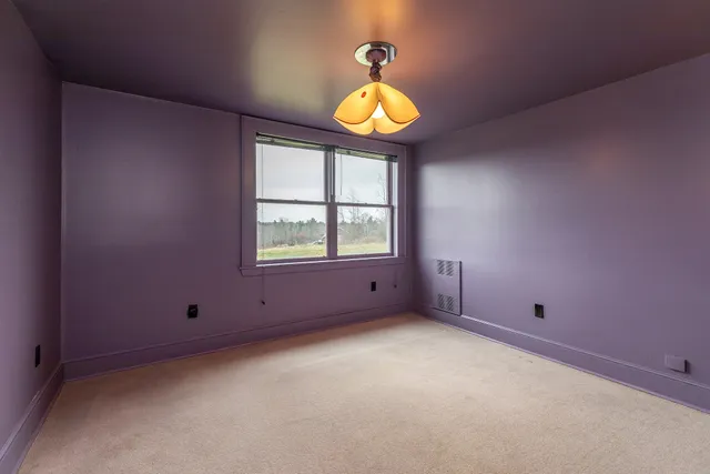 a view of entryway with livingroom