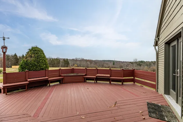 a view of sitting area with furniture and wooden floor