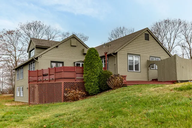 a view of a swimming pool with lounge chair