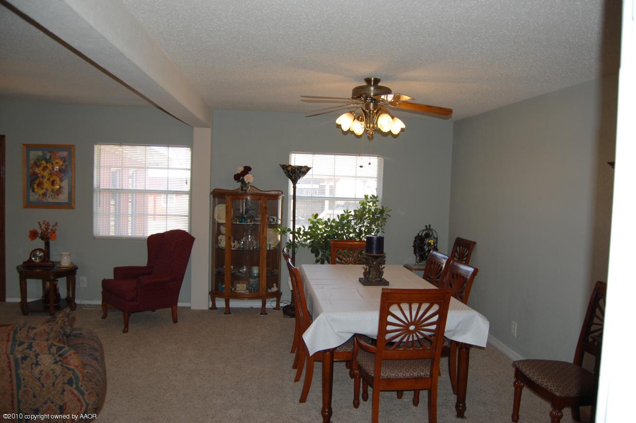 6706 Hatton Road Amarillo, TX 79110 - Photo 12 of 23 a view of a livingroom with furniture and a window
