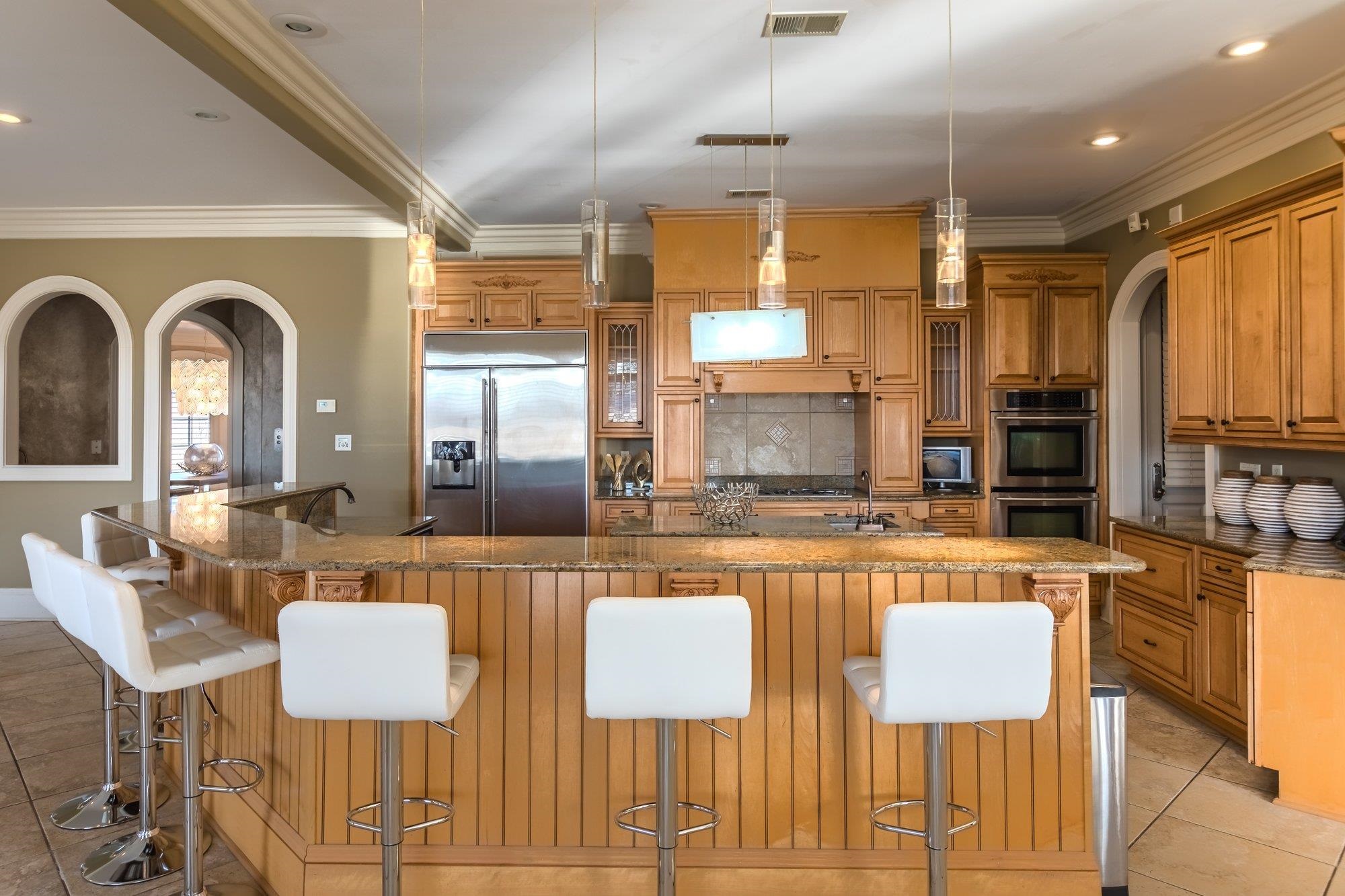 2535 Preakness Drive Eads, TN 38028 - Photo 11 of 34 a large kitchen with a table and chairs