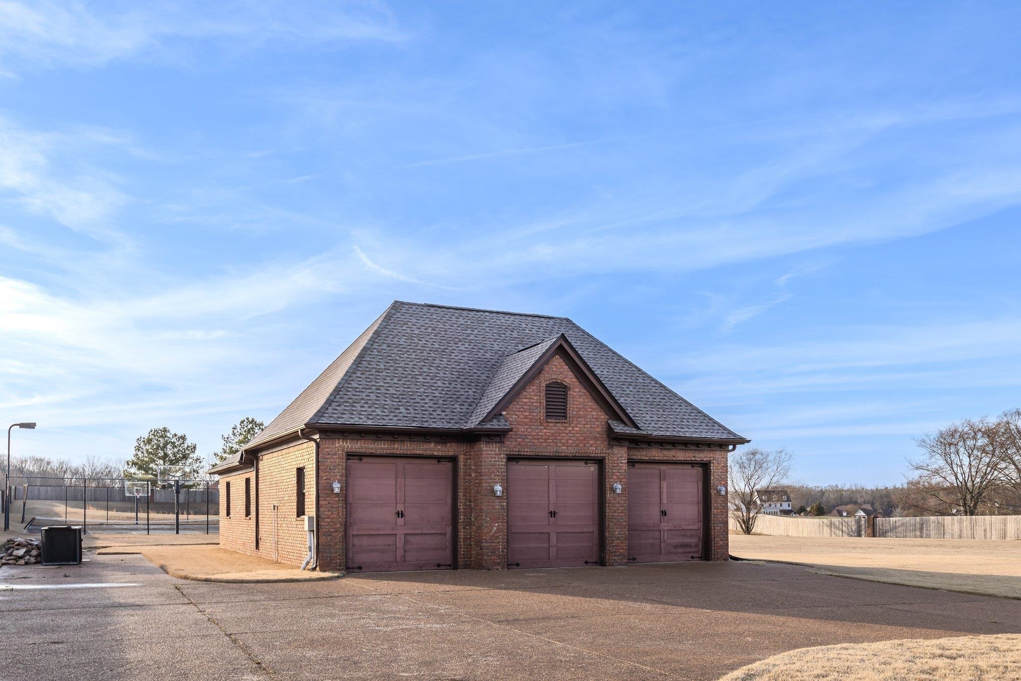 2535 Preakness Drive Eads, TN 38028 - Photo 32 of 34 a front view of a house with a yard and garage