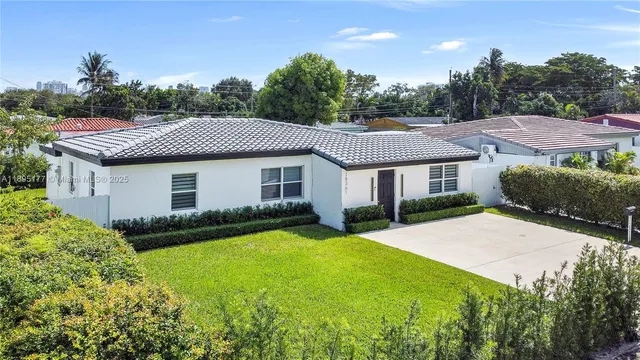 a aerial view of a house with garden
