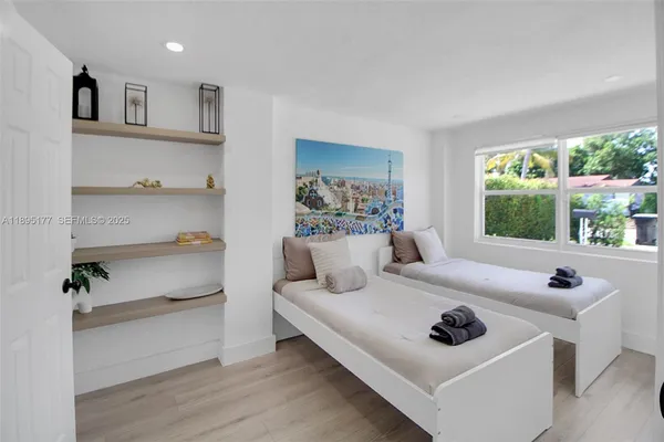 a living room with furniture and a window