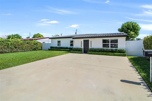 front view of a house with a street