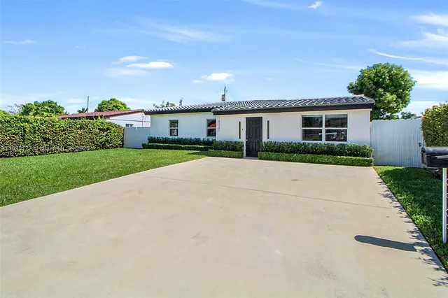 front view of a house with a street