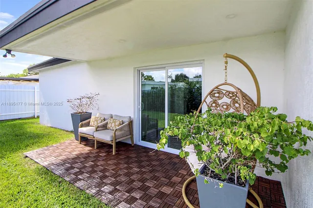 a garden view with a seating space