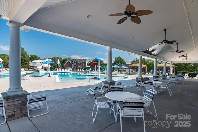 a outdoor space with lots of tables and chairs